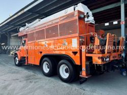 2001 INTERNATIONAL 4900 CAMION BARRENADOR CON CANASTILLA c