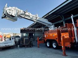 2001 INTERNATIONAL 4900 CAMION BARRENADOR CON CANASTILLA h